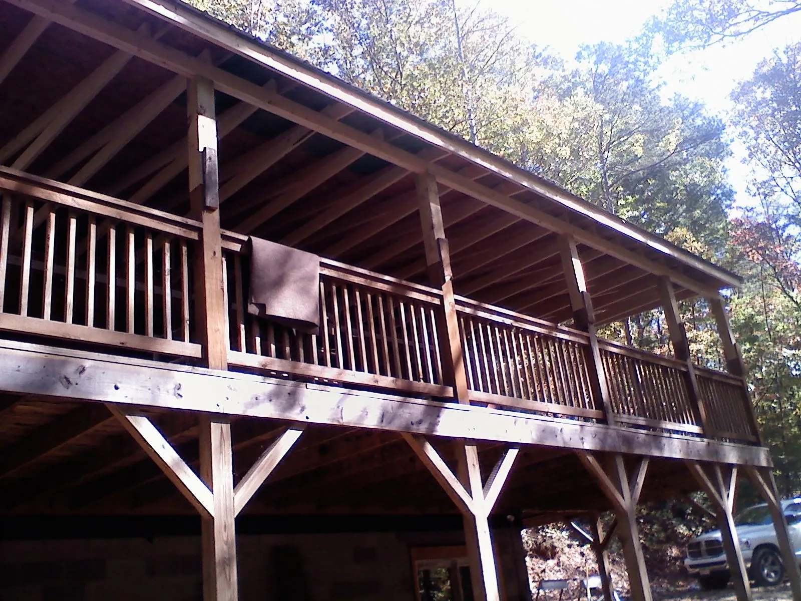 Timber framing under a new elevated porch and deck — Roof Leak Repair in Newark by Roofing Brothers